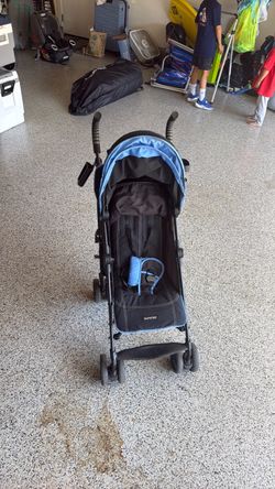 Folding baby travel stroller