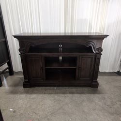 Dark Wood Traditional Style TV Stand with Ornate Carvings