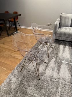 2 acrylic side chairs