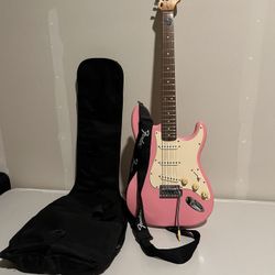 Pink Fender Guitar