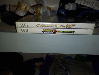 3 WII GAMES & BATTERY $25.00 