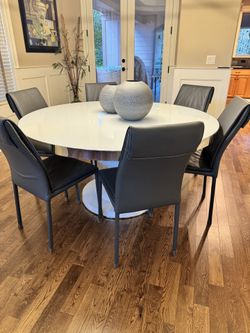 60” round table with 6 chairs