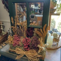 Vintage Mirrored Window With Dried Flowers And Grass