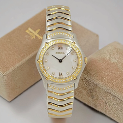 Ladies Ebel 28mm Classic Wave Two Tone 18K Yellow Gold / Stainless Steel Watch with Mother of Pearl Diamond Dial and Diamond Bezel. (Pre-Owned Box/Car