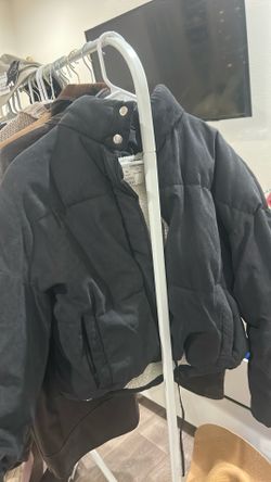 Black puffer, sweater