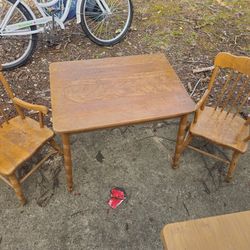 Price is firm.. children's real wood table and chairs