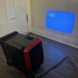 RCA Portable Bluetooth Speaker with Built-in Projector