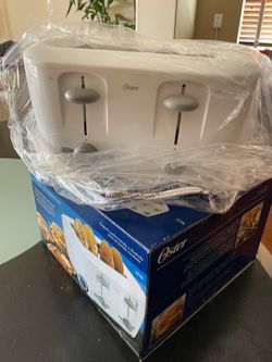 Oster 4 slice toaster Brand New