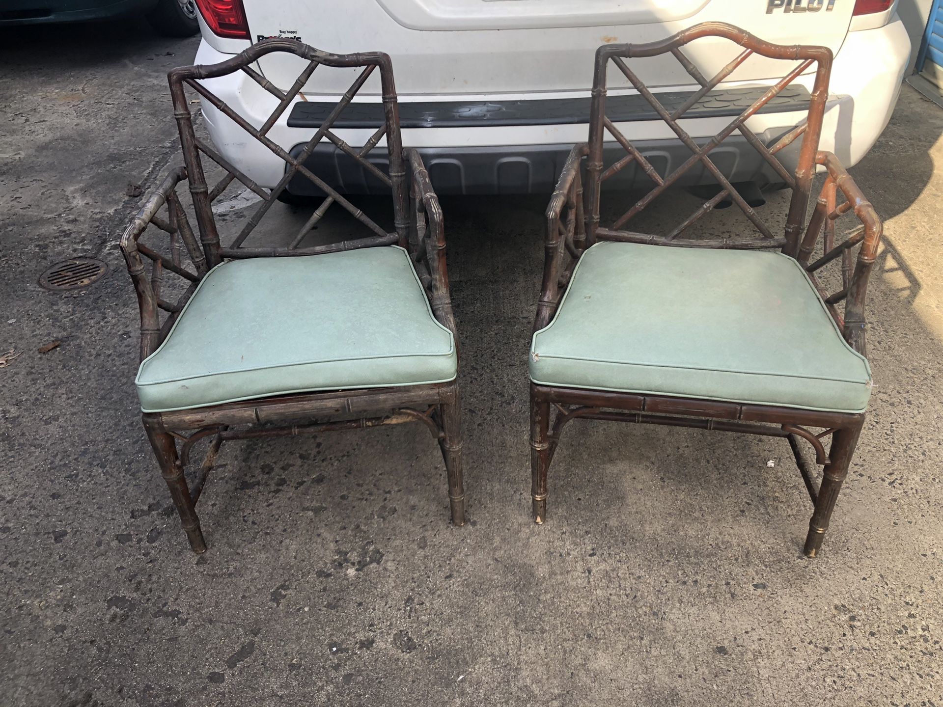 Two wooden Chinese Chippendale chairs. Need restoration.