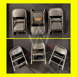 (3) WWE toy steel chairs