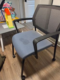 Rolling office chair..silla de oficina