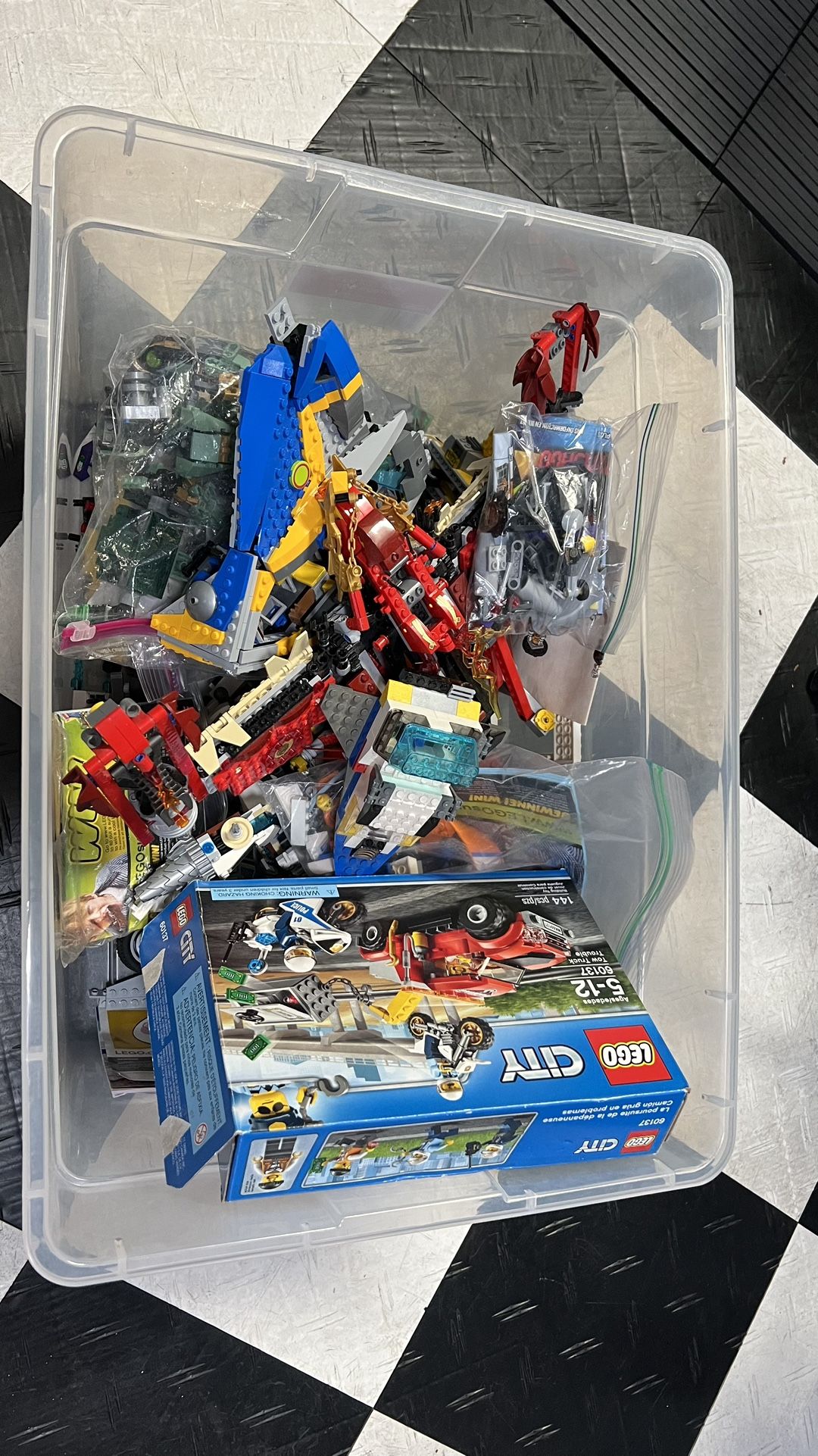 Bin of Lego bricks (complete and incomplete sets)
