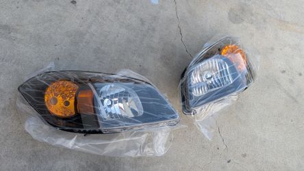 2005-2010 cobalt black headlights