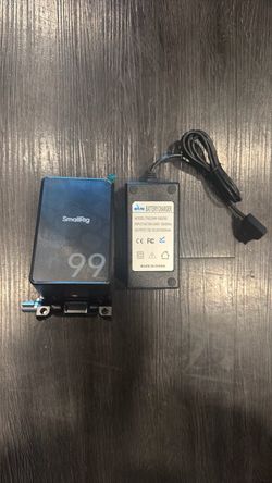 SmallRig VB99 V-mount battery with its battery charger/power adapter