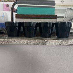 4 Small Flower Pots