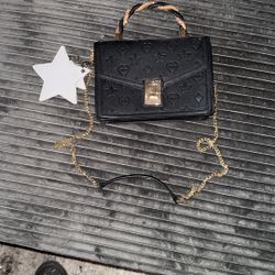 This is an ALDO Crelalleex black crossbody bag