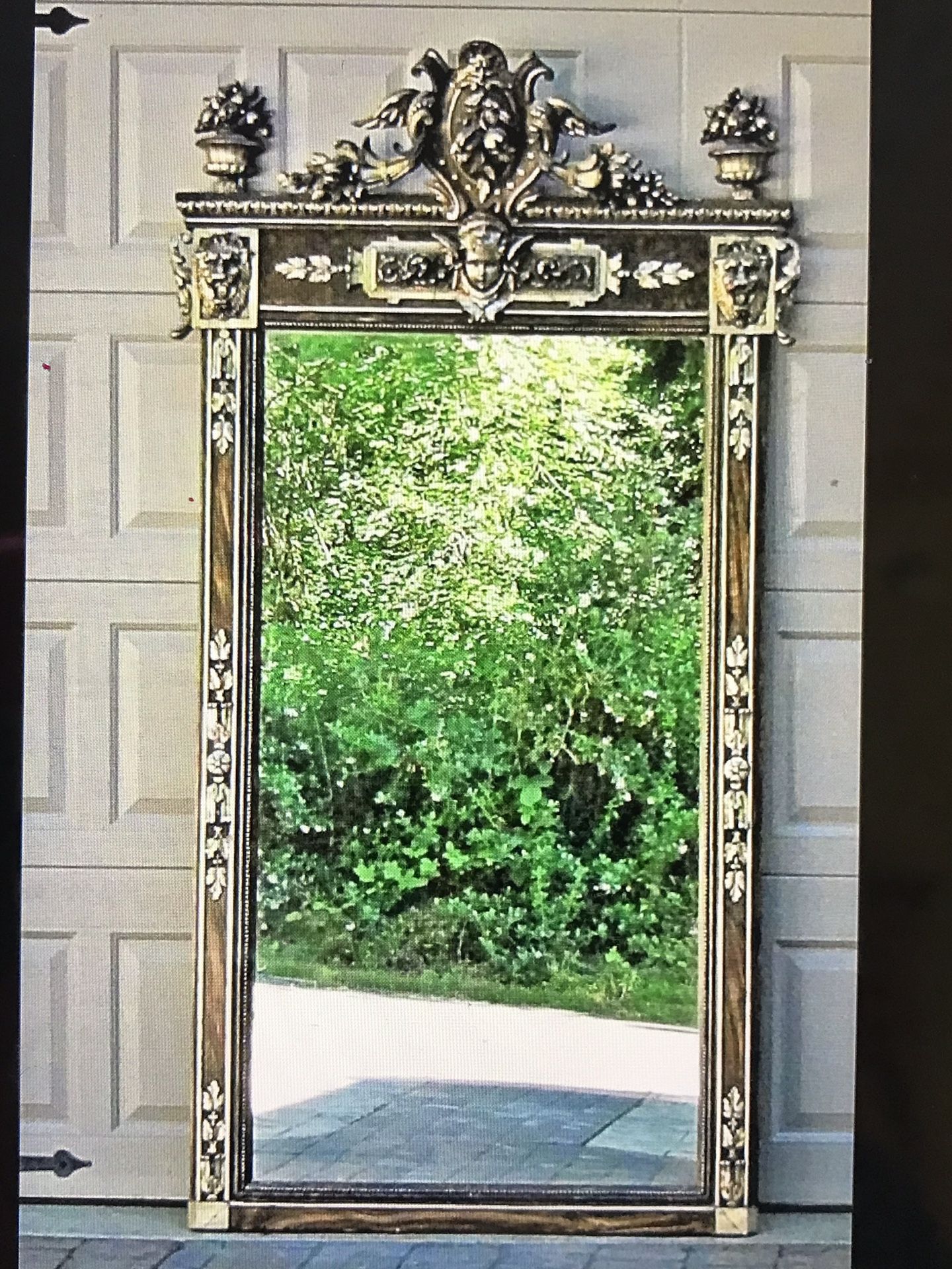 Antique 19 c Renaissance Revival style Cherub face and Twin Lion head Mirror.