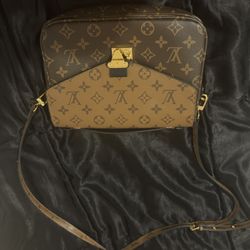 Louis Vuitton Pochette Métis