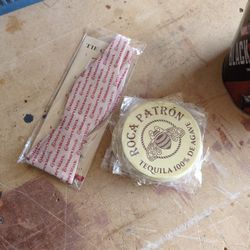 Maker marks ties and Roca patron tequila coasters ,six packs with 3 in each packeach