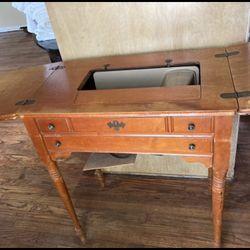 Sewing machine and cabinet 