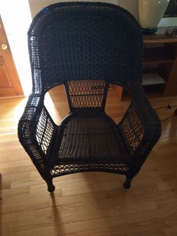 Brown vynil wicker chair used in Warrenville