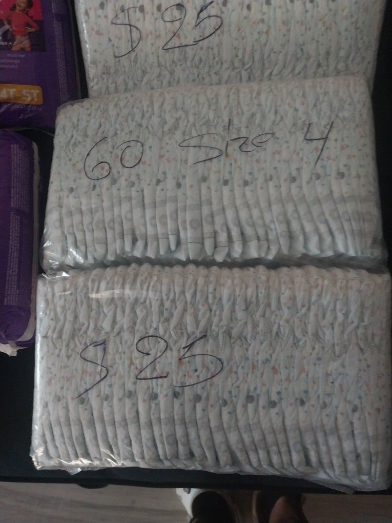 HUGGIES LITTLE MOVERS PLUS SIZE 4 $25 BAG 60 DIAMPERS PULL UPS SIZE 4T5T $25 66 COUNT