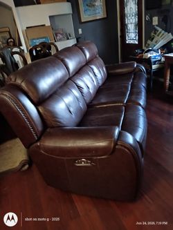 This is available!6/27 Genuine Leather recliner couch with one excellent working recliner