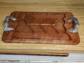 Wood cutting board with metal handles