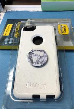 Original Otter box 6 plus with free pop back.