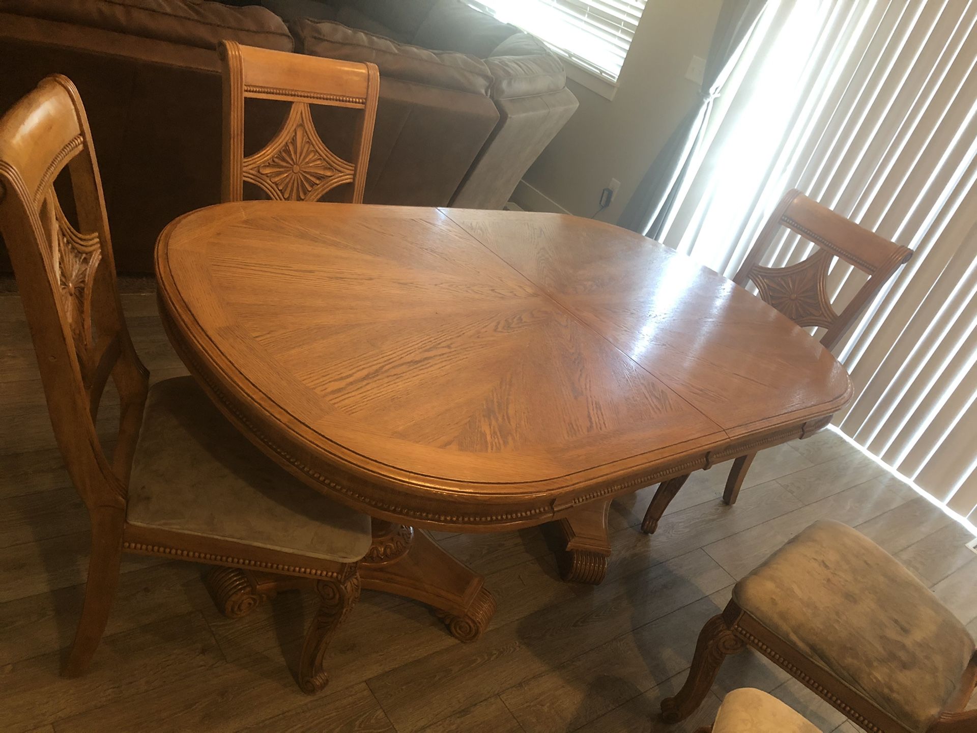 Kitchen table 8 chairs an extra leaf. And a buffet