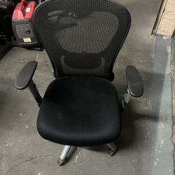 Black on black fabric, rolling Office chair