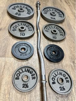 Gently USED Standard Equipment: Curl Bar with Cast Iron Weight Plates 25s, 10s, 5s and 2.5s. (Total: 103 lbs)