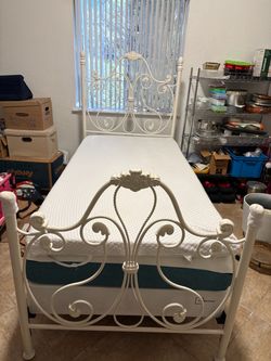 Solid rod iron bed