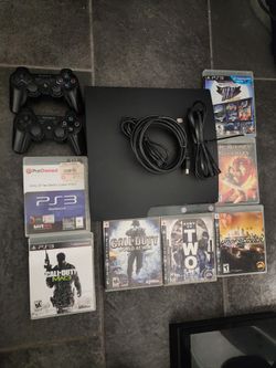 Sony Playstation 3 With 7 Games And 2 Controllers