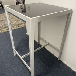 High table with glass top