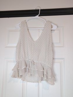 medium Women's cream ruffled tank top