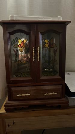 Jewelry cabinet with variety of jewelry