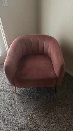 Pink velvet barrel-style accent chair