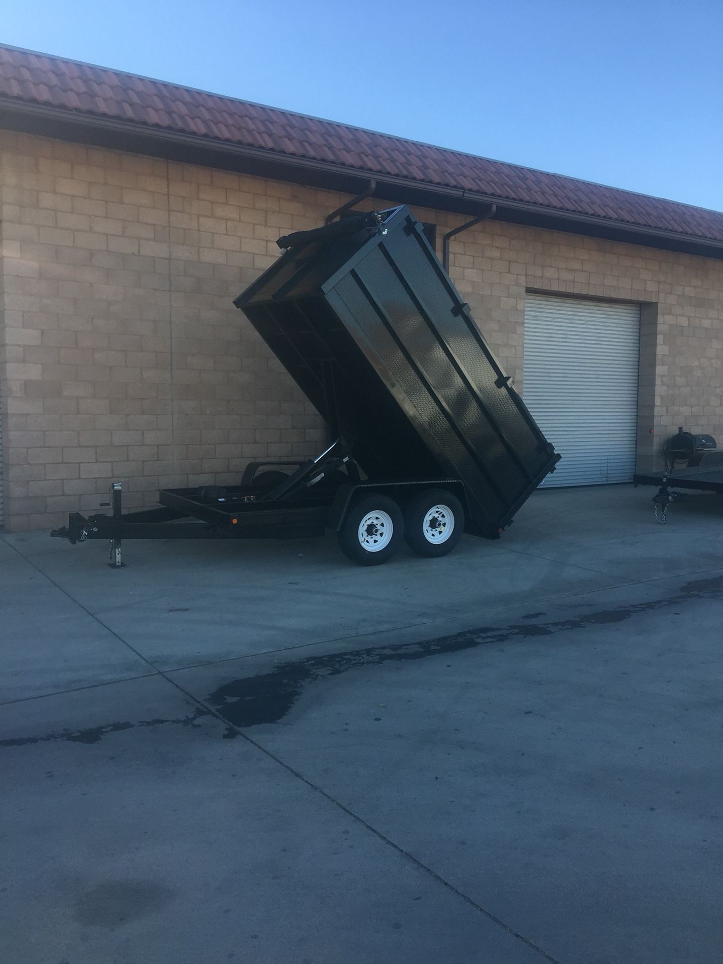 Brand new 8x12x4 HD dump trailer