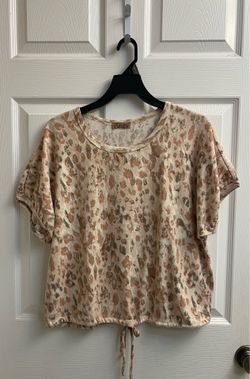 Brand new Ladies blush animal print top size L