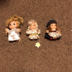 Small Precious Moments Porcelain Dolls