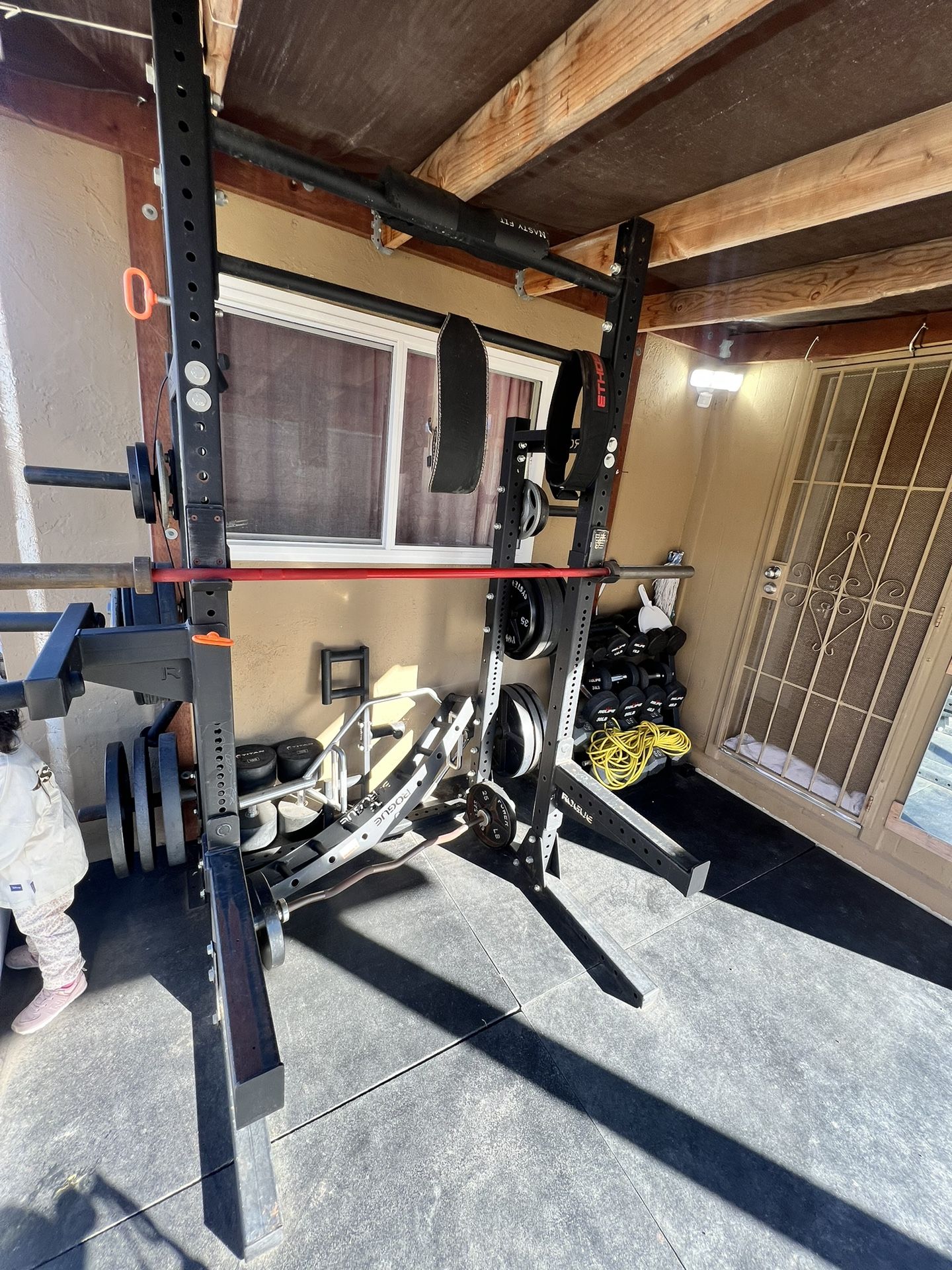 Rogué Lite Squat Racks And Weight Plates 