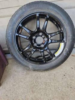 Infiniti full spare tire pnly used one time great condition five spoke