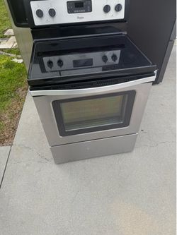 (Price Is $400) GE Slide In Stove