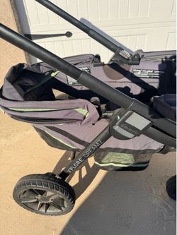 Evenflo Pivot Xplore Dreamz All-Terrain Stroller Wagon with Bassinet Insert (Voyager Green)