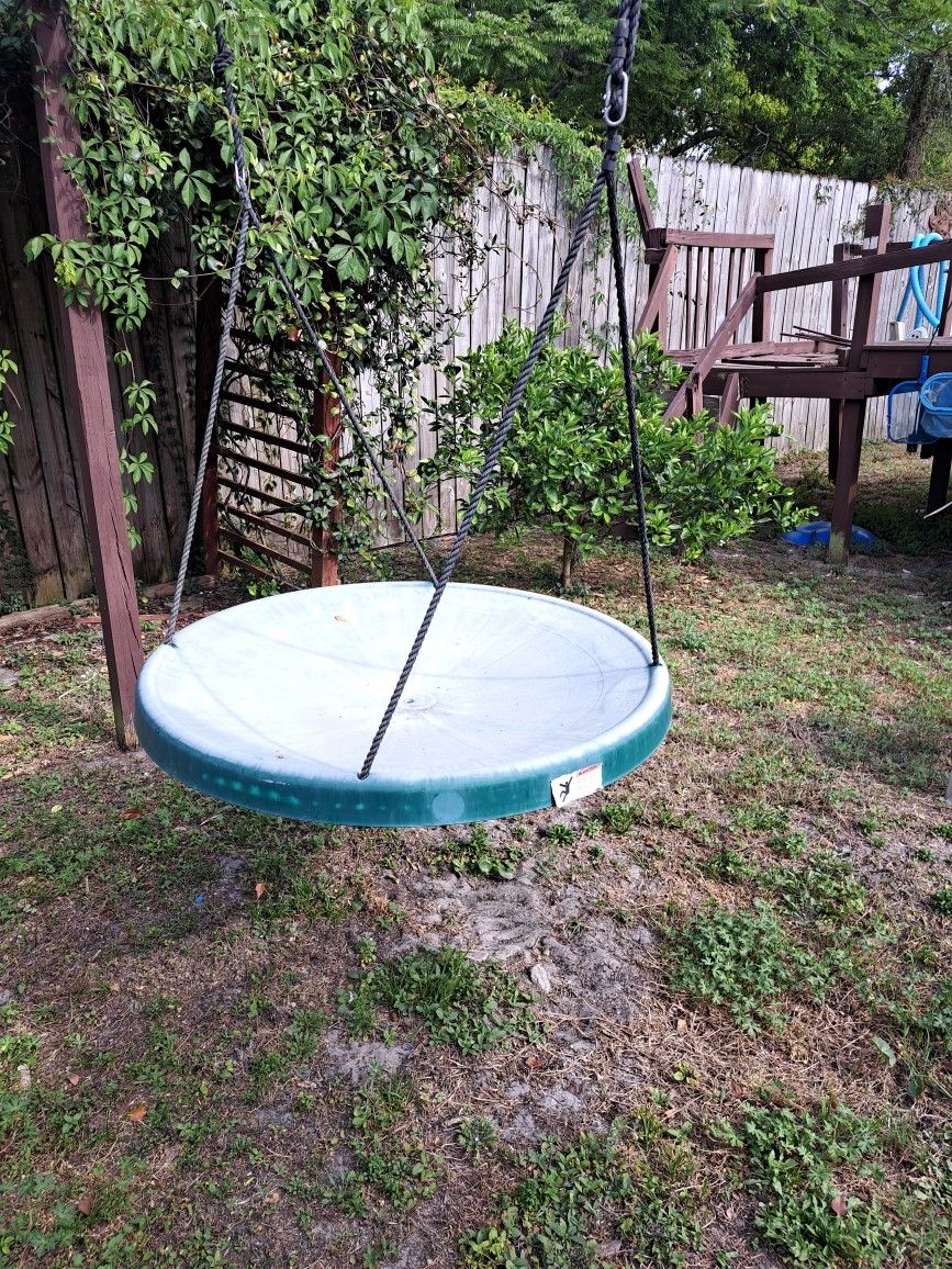 For sale : Super Spinner Disc Swing , hanging hardware included. Holds up to 650 lbs.