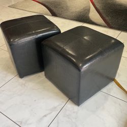 Two Black Ottoman