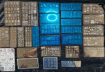 Nail stamping plates