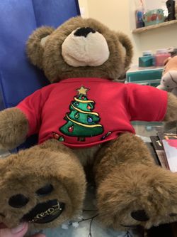 BABW Bearemy bear wearing a red christmas sweater with a Christmas tree.