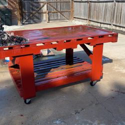 Red Work Shop Table On Roller Wheels